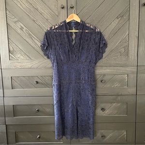 Nicole Miller Navy Stretch Lace Dress in a Size Large.
